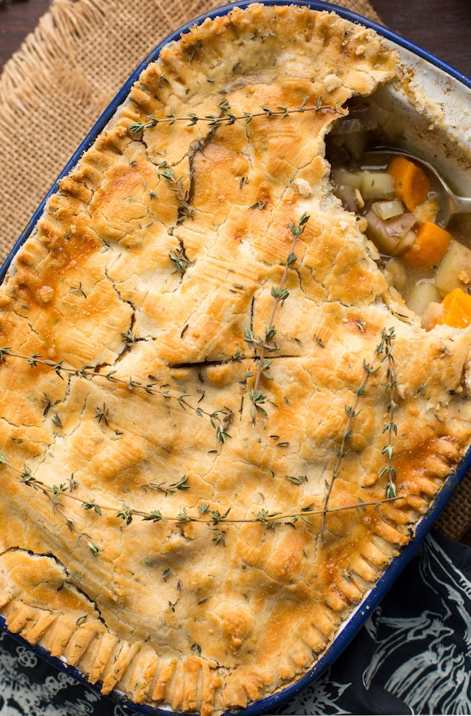 Lightened up Gluten Free Chicken Pot Pie loaded with veggies & topped with an herby crust | Dairy Free Option Available
