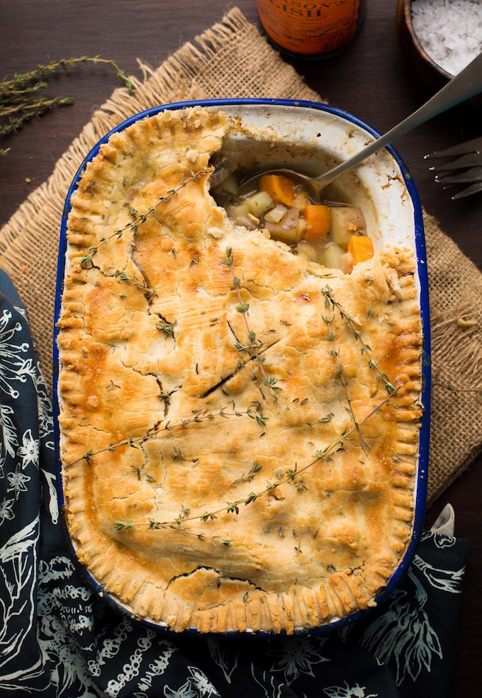 Lightened up Gluten Free Chicken Pot Pie loaded with veggies & topped with an herby crust | Dairy Free Option Available