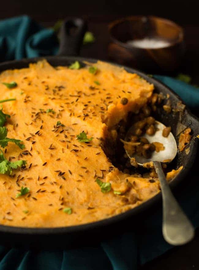 Moroccan Spiced Vegan Shepherd's Pie with a spoon 