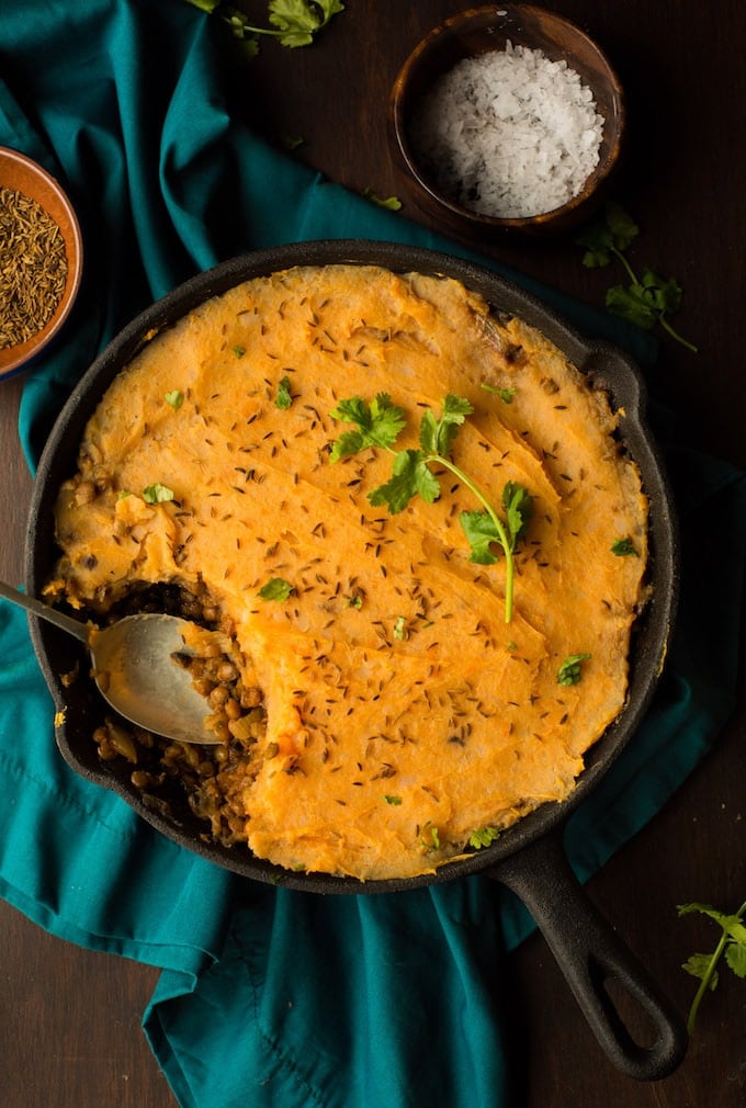 a cast iron skillet full of Moroccan Spiced Vegan Shepherd's Pie 