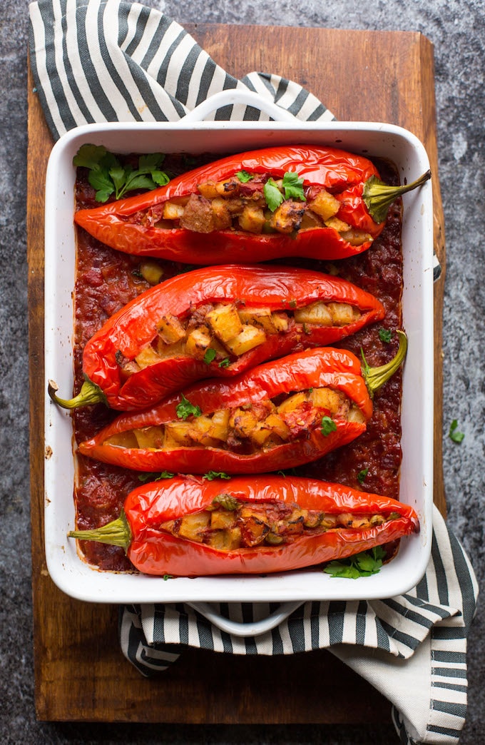Potato and Olive Stuffed Banana Peppers in a baking dish