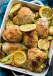 Simple, Roasted Lemon & Fennel Chicken Thighs with potatoes in a baking dish