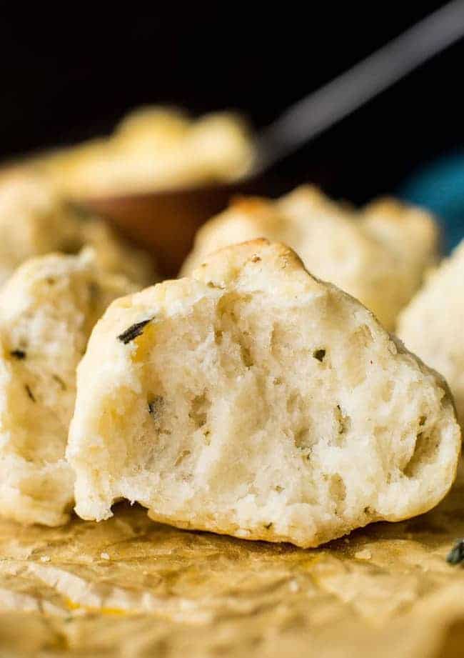 Vegan & gluten free biscuits ripped open to show the soft inside 