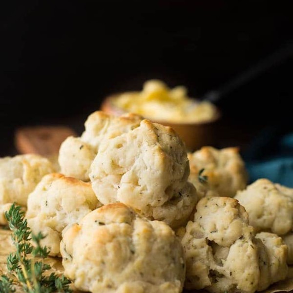 Vegan & gluten free biscuits stacked on a cutting board