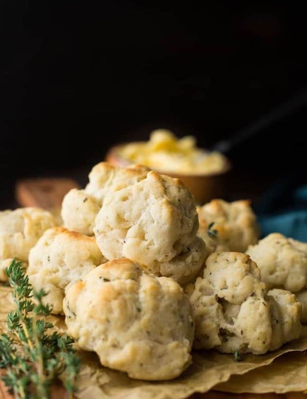 Vegan & gluten free biscuits stacked on a cutting board