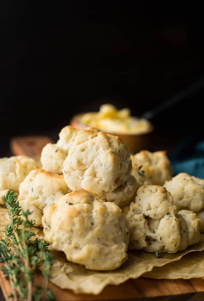 Vegan & gluten free biscuits stacked on a cutting board