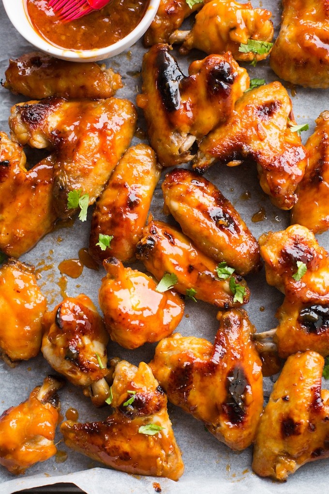 Honey Sriracha Wings up close with chopped cilantro 