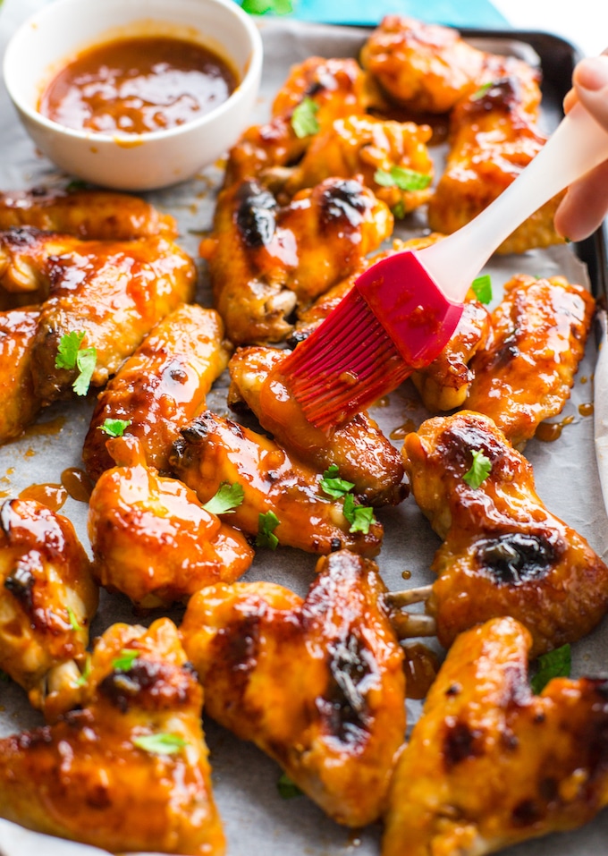 Honey Sriracha Wings with added hot sauce brushed over the top