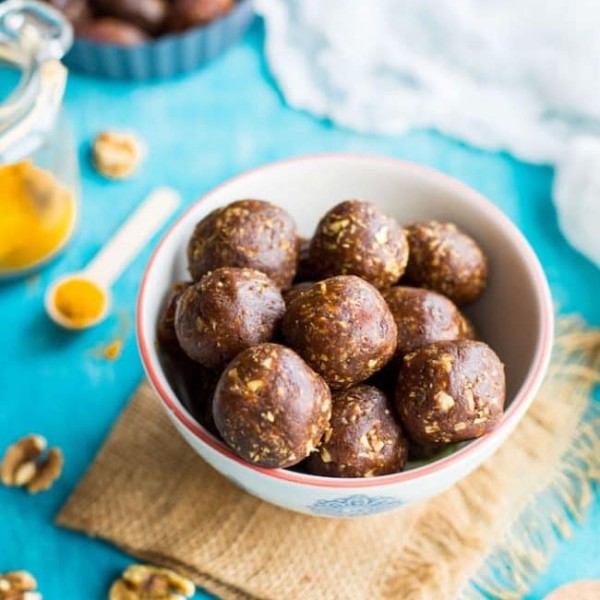 Turmeric Snack Bites in a bowl with turmeric powder