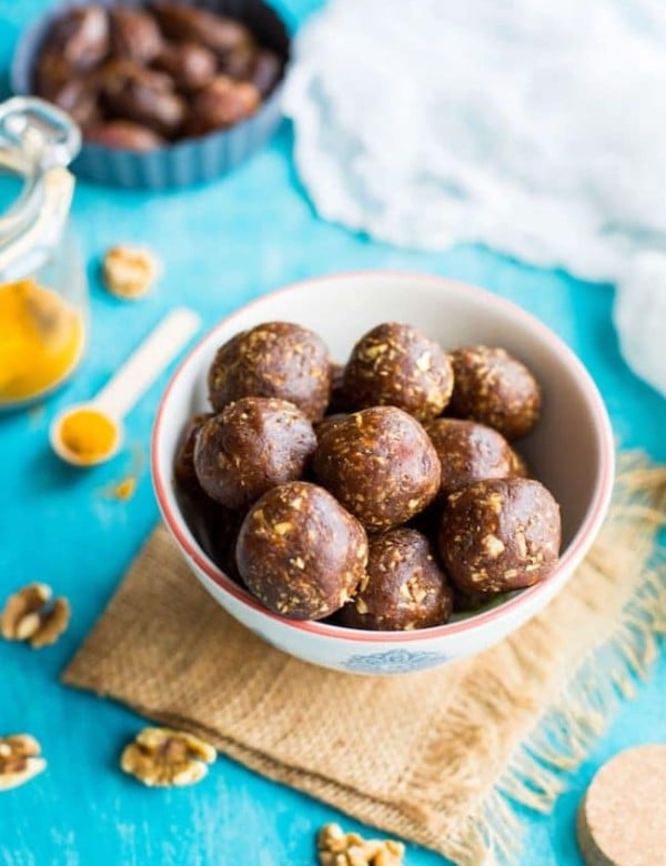 Turmeric Snack Bites in a bowl with turmeric powder