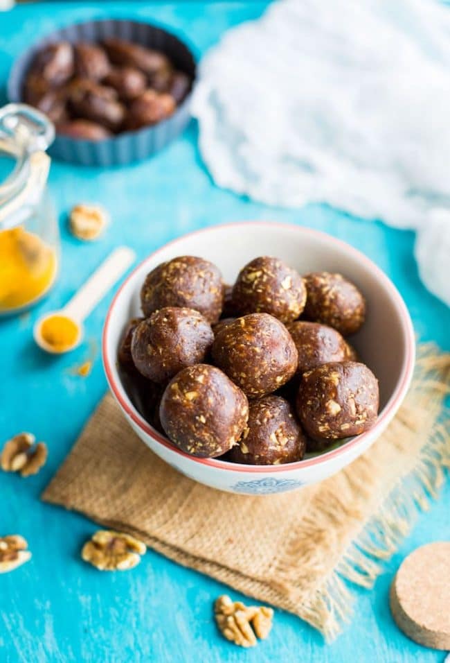 Turmeric Snack Bites in a bowl with turmeric powder 