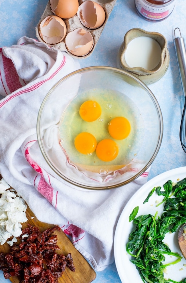 eggs in a mixing bowl to make sun dried tomato quiche