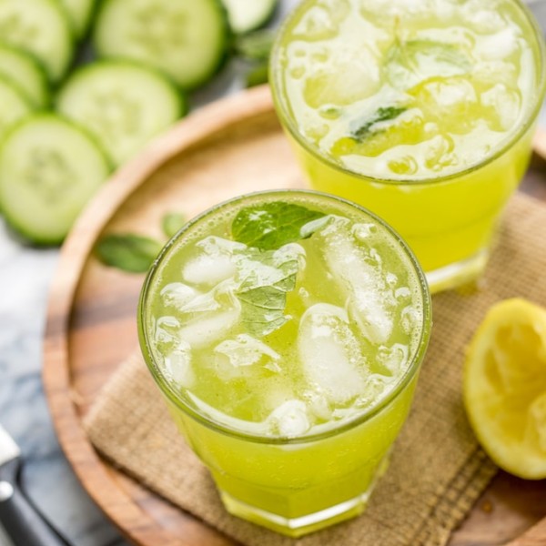 Mint Cucumber Lemonade in a glass with mint leaves