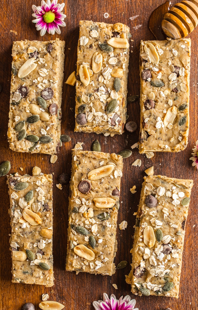 Peanut Butter No Bake Granola Bars cut into 6 bars with chopped peanuts, pepitas and oats 