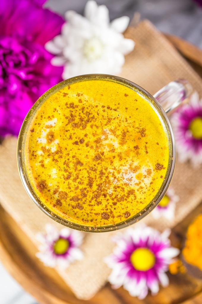 Golden Turmeric Latte with cinnamon sprinkled over the top - view from the top down #glutenfree + #vegan + #paleo