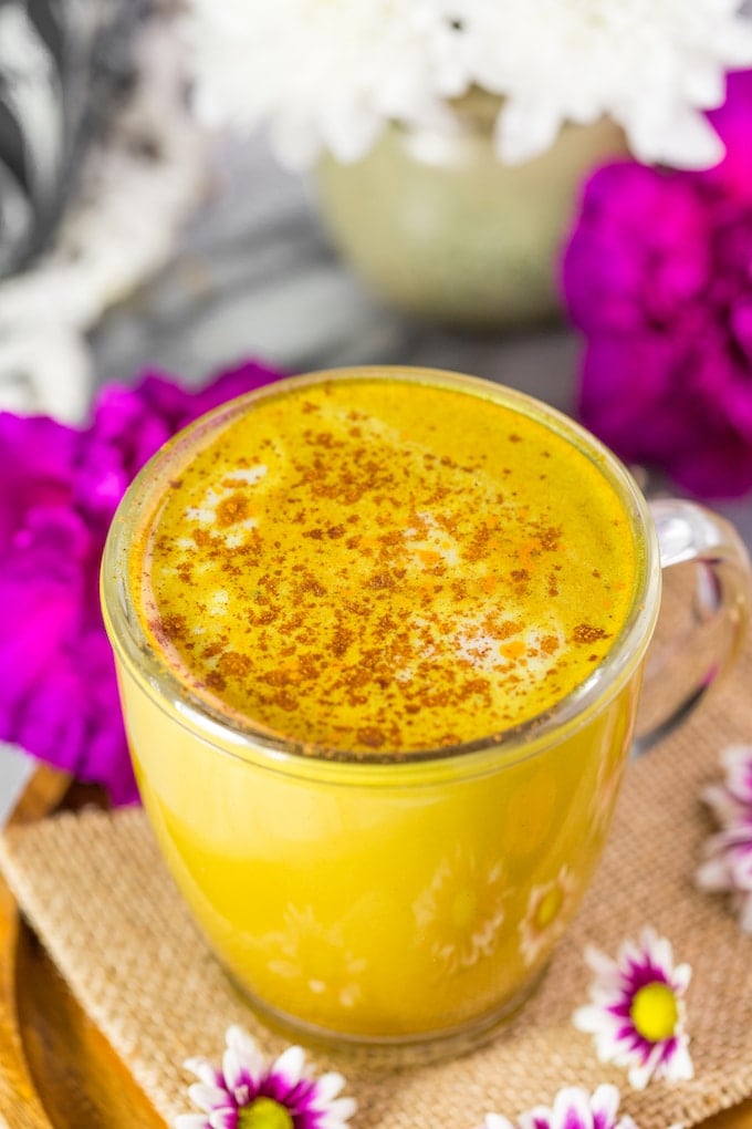 Golden Turmeric Latte on a plate #glutenfree #vegan #goldenmilk