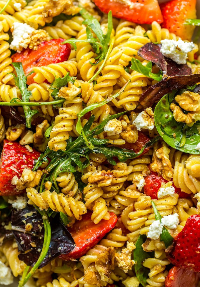 Balsamic Strawberry Pasta Salad up close sprinkled with pepper