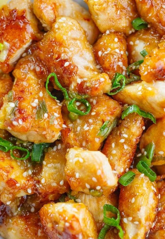 healthy Chinese Lemon Chicken up close with sesame seeds and spring onions