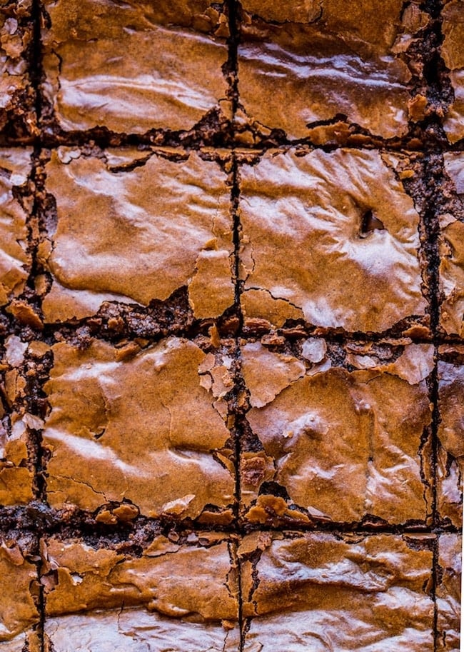 Vegan Chickpea Brownies cut into squares with a crinkly top
