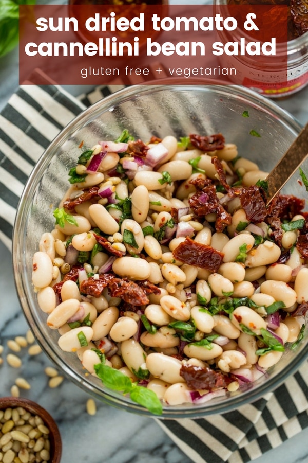 Creamy, punchy and tangy Sun Dried Tomato & Cannellini Bean Salad - make in 15 minutes or less with minimal prep! Serve as a simple side, as a snack or starter with bread or crackers or enjoy as a light lunch or dinner. #GlutenFree + #Vegetarian + #Vegan Option #beansalad #summersalad #healthyrecipe