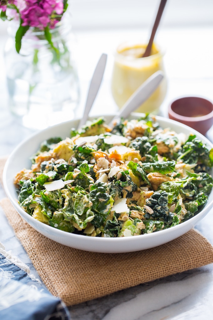 Salmon Kale Caesar Salad pictured at a 45° angle