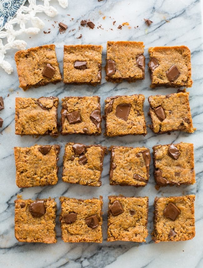 Paleo Vegan Blondies cut into squares on a marble counter