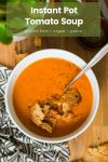 tomato soup in a bowl with croutons and the name: Instant Pot Tomato Soup'