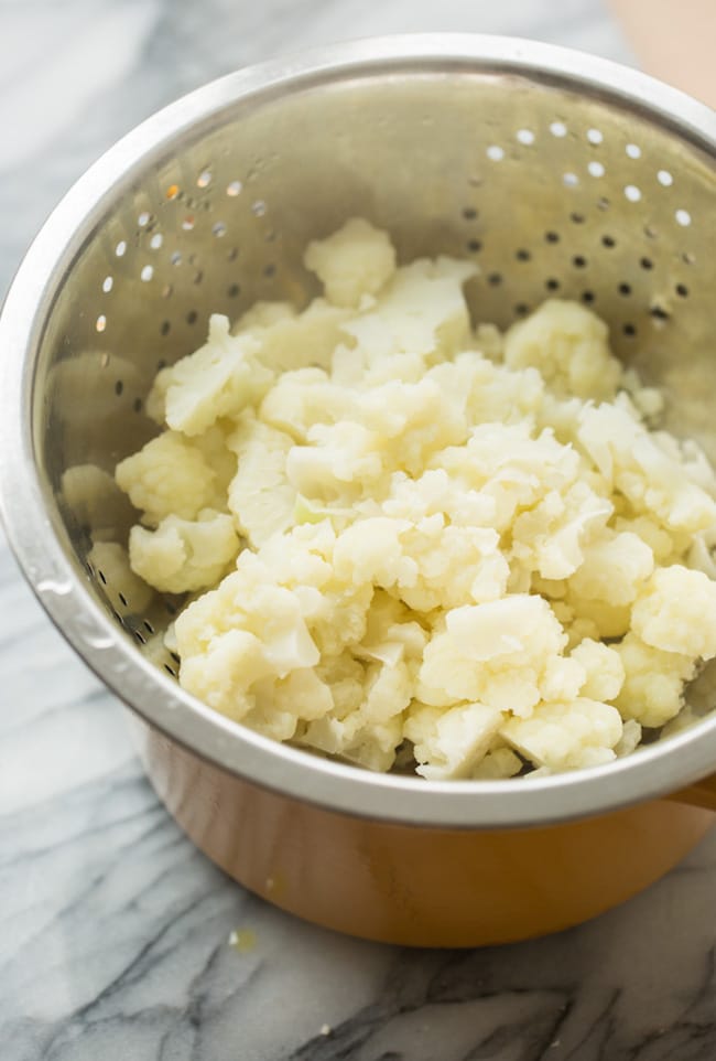 steamed cauliflower for the mashed cauliflower in colander 