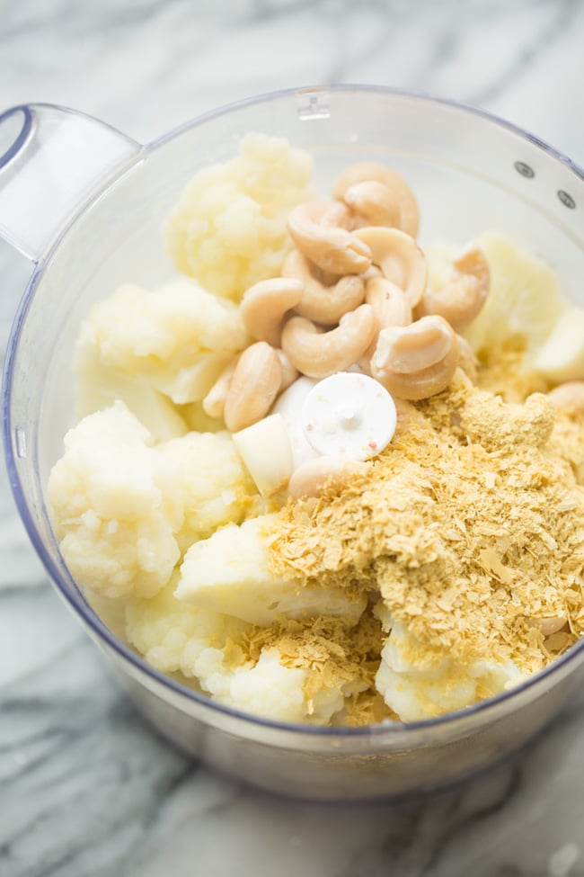 mashed cauliflower ingredients in a food processor 