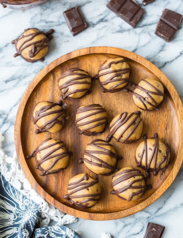 Peanut Butter Cookie Dough Truffles on a wooden plate