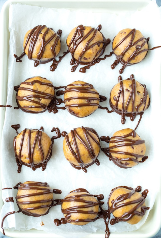 Peanut Butter Cookie Dough Truffles drying on a baking sheet