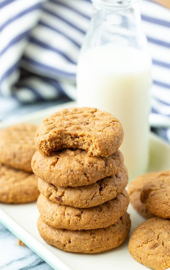 gluten free vegan peanut butter cookies stack with a bite taken out of the top