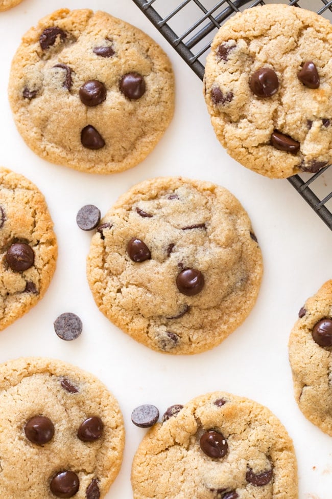 Almond Flour Chocolate Chip Cookies surrounded by chocolate chips