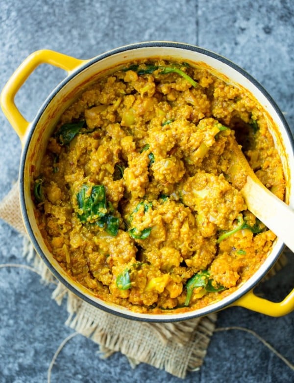 Golden Cauliflower Quinoa Curry in a yellow pot