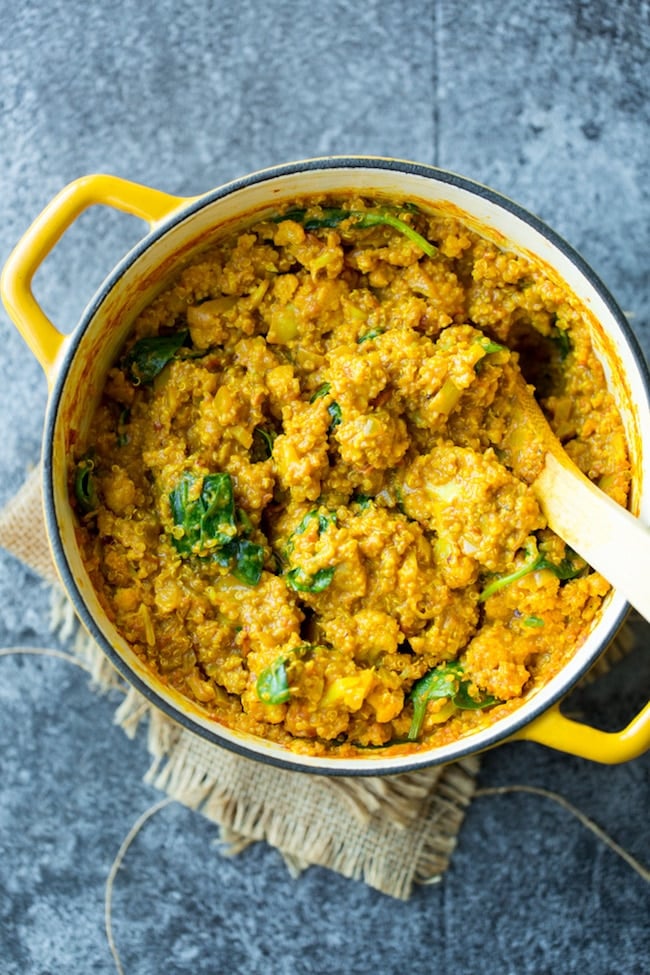 Golden Cauliflower Quinoa Curry in a yellow pot