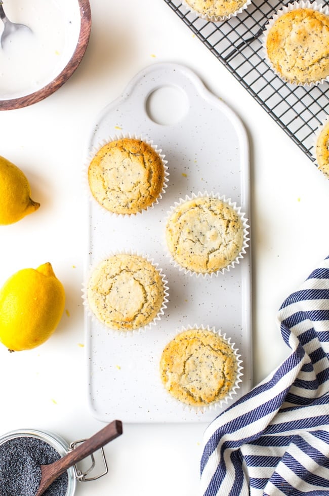 Paleo Vegan Lemon Poppy Seed Muffins on a cutting board