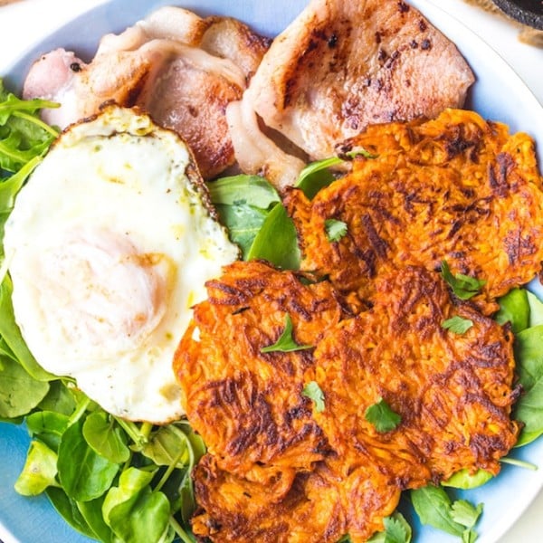 Sweet Potato Hash Browns in a bowl with bacon eggs and salad