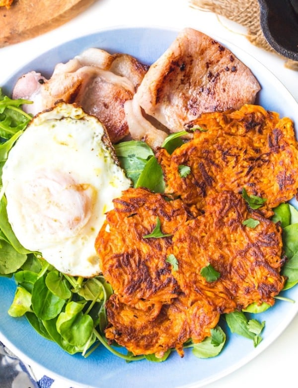 Sweet Potato Hash Browns in a bowl with bacon eggs and salad