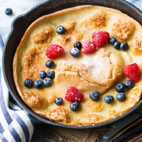 Gluten Free Dutch Baby topped with fresh berries