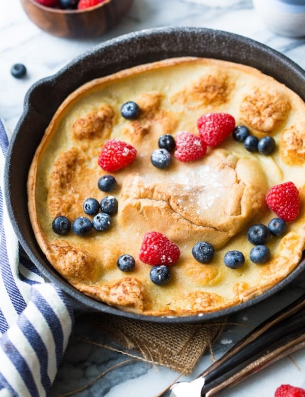 Gluten Free Dutch Baby topped with fresh berries