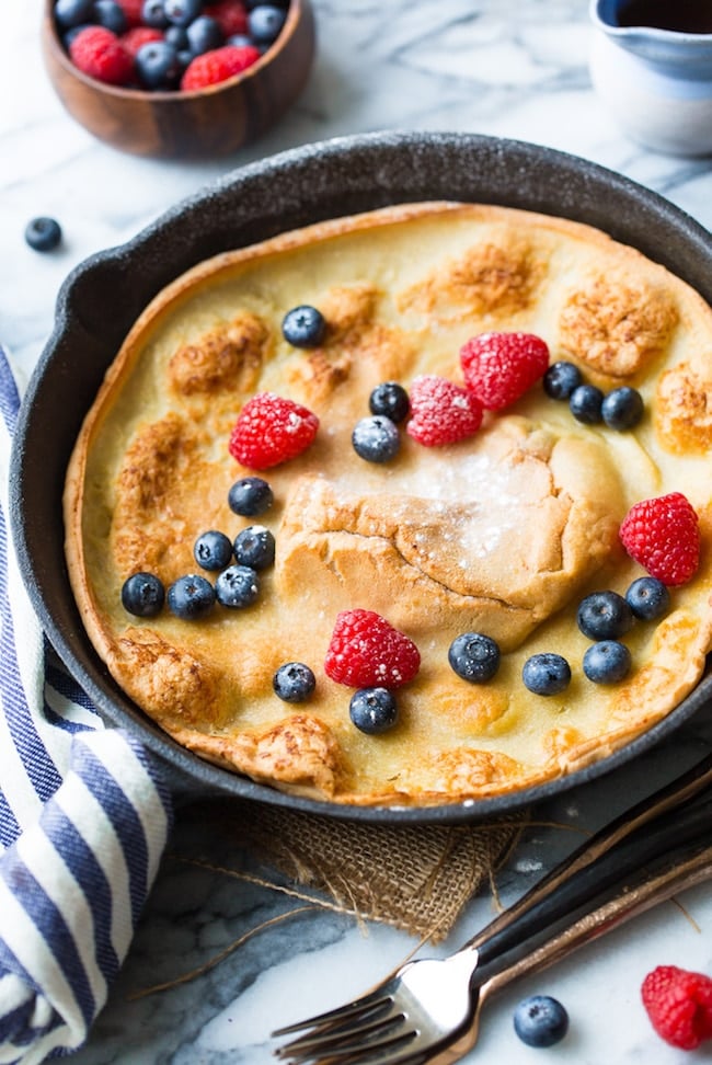 Gluten Free Dutch Baby topped with fresh berries