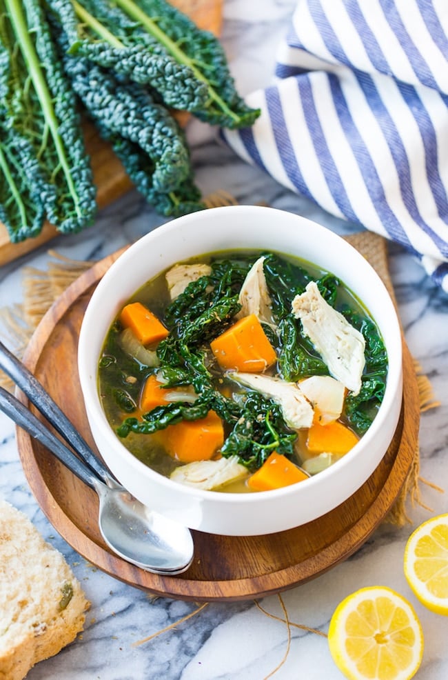 Sweet Potato Kale & Chicken Instant Pot Soup in a bowl on a plate