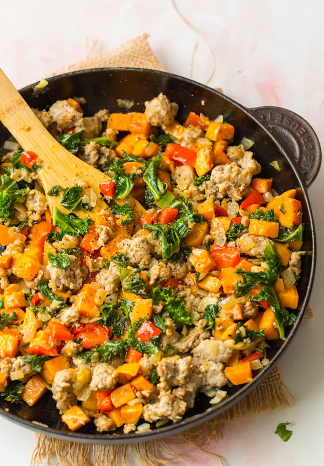 Sausage Kale Sweet Potato Hash in a cast iron skillet