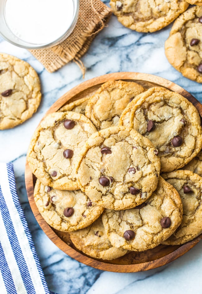 gluten free chocolate chip cookies on a wooden plate