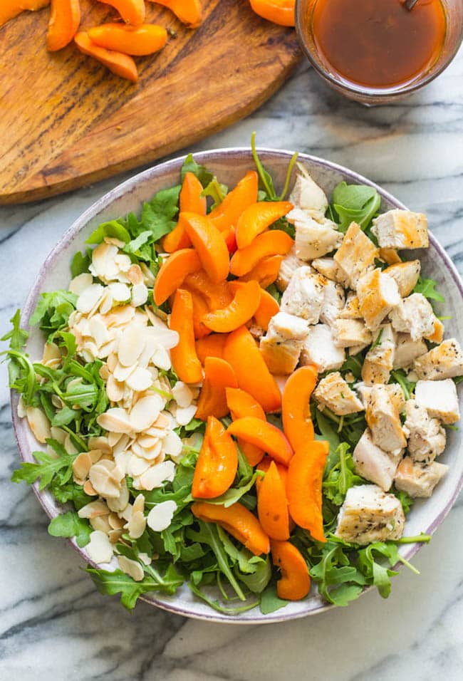 Almond & Apricot Chicken Salad in a bowl before it's mixed together