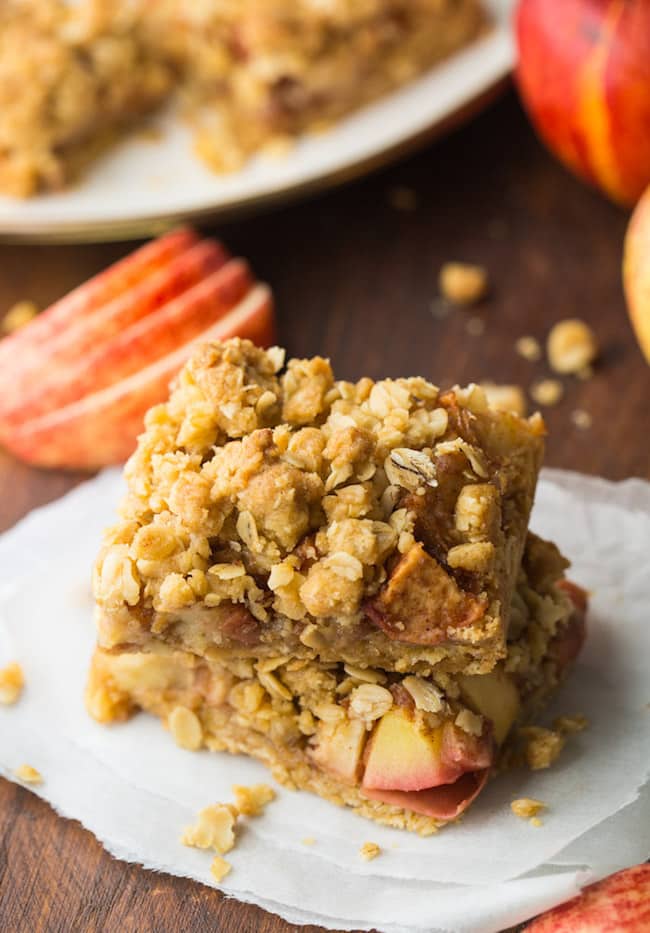 apple crumble bars on a wooden cutting board