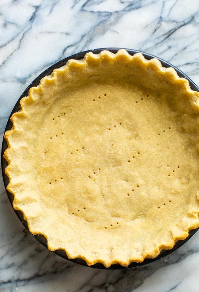 almond flour pie crust on a marble surface