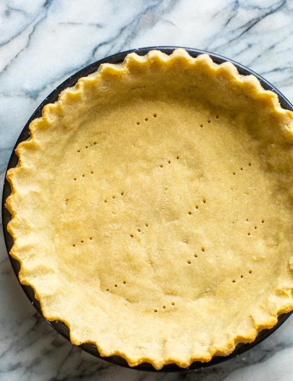 almond flour pie crust on a marble surface