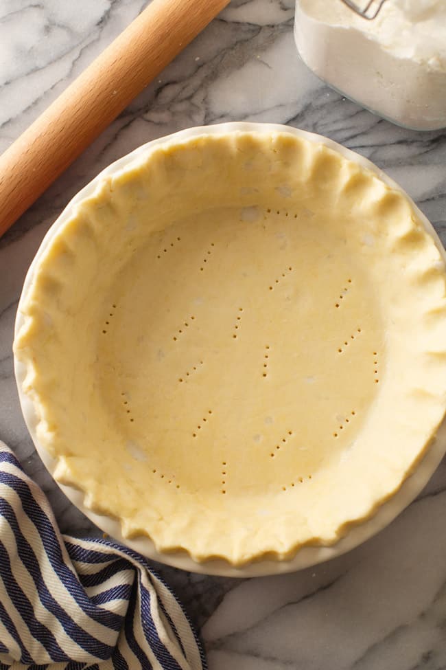 gluten free pie crust on a marble counter