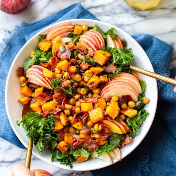 Roasted Sweet Potato & Chickpea Kale Apple Salad with Bacon in a bowl